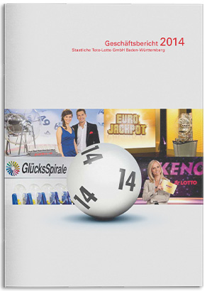 Zwei Geschäftsberichte von 2014 liegen aufeinander. Das Cover zeigt eine Lottokugel mit der Zahl 14.